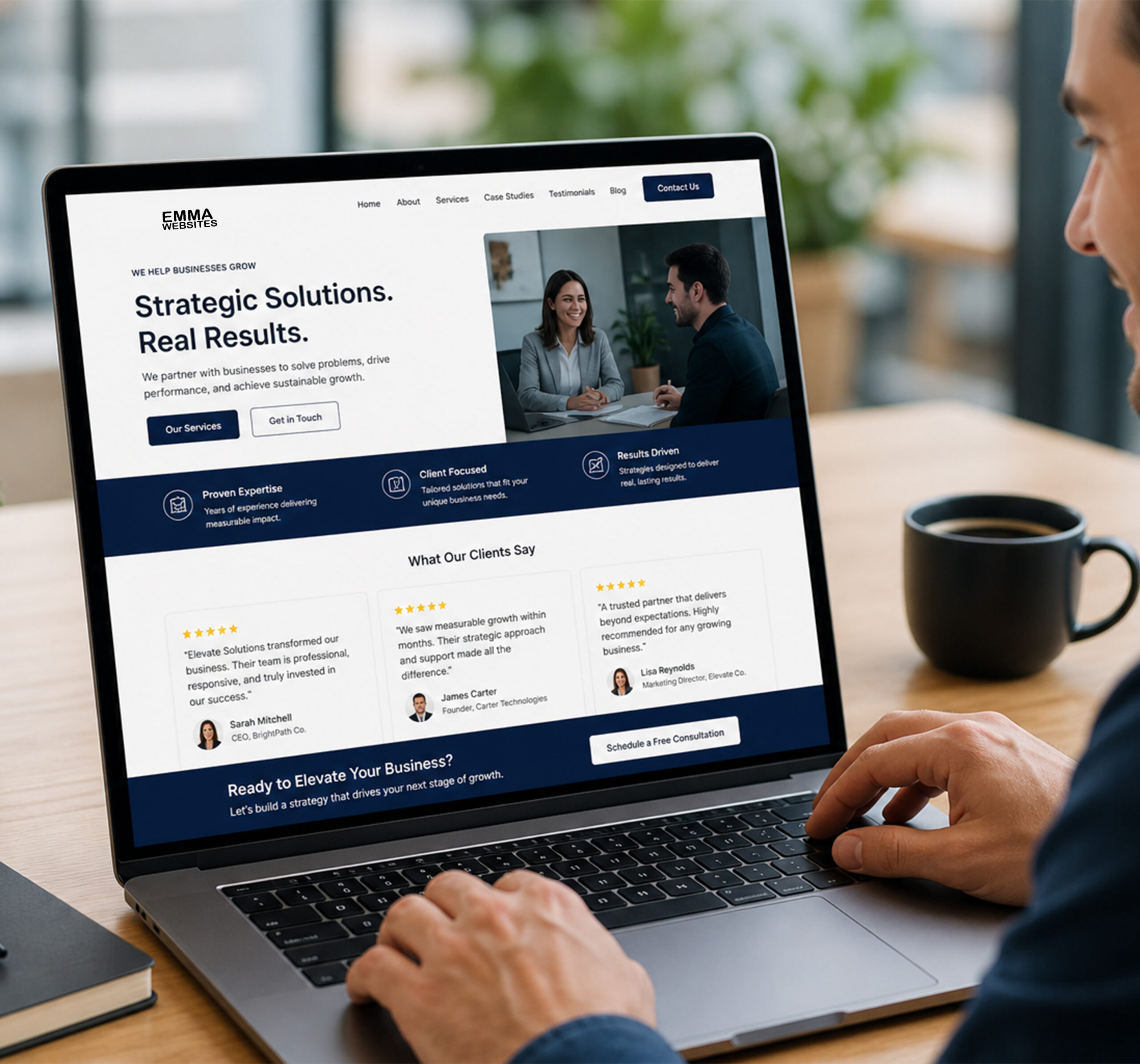 Man reviewing a website layout on laptop created by Emma Websites